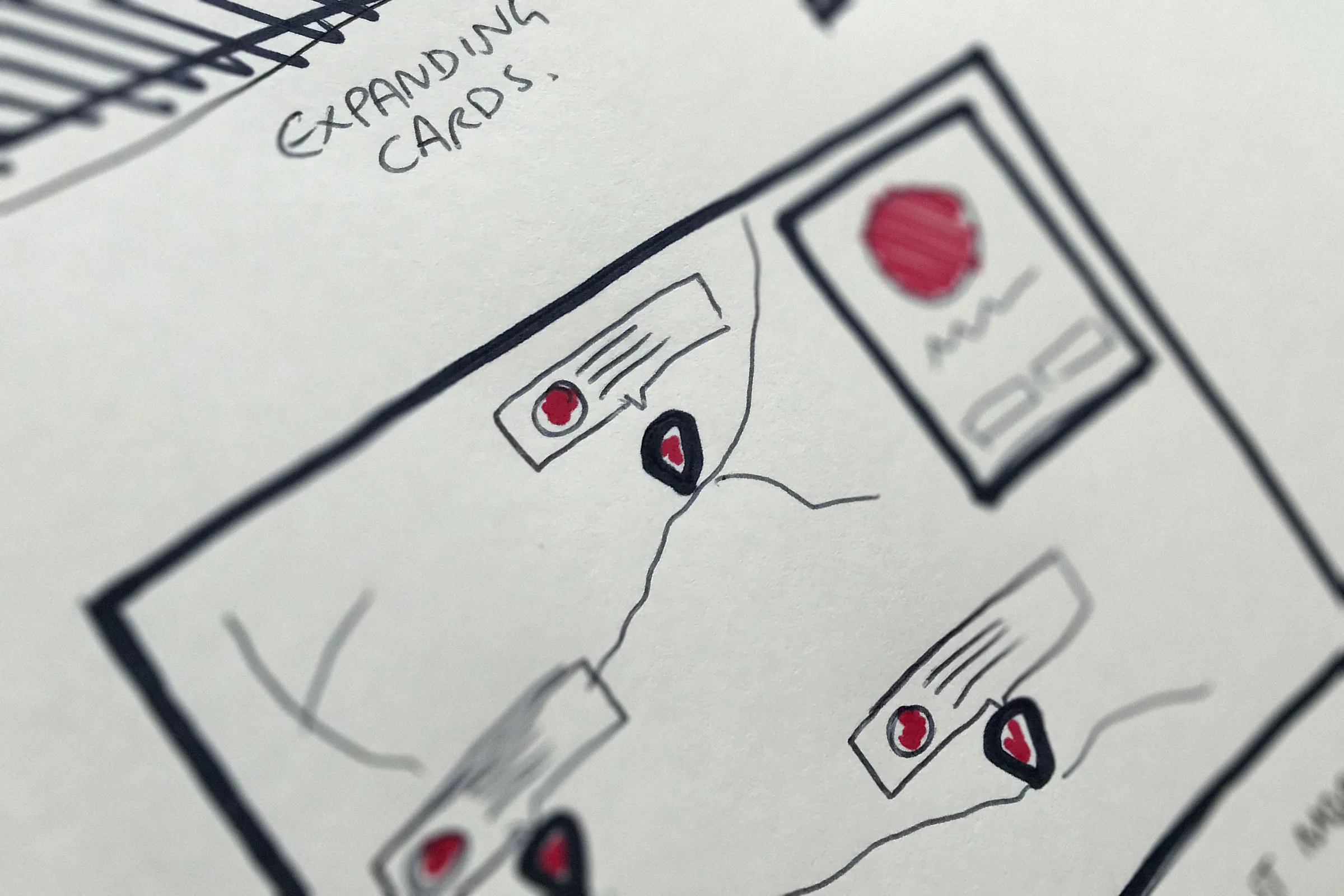 Notebook sketch of map pins that open into expanding cards with driver details
