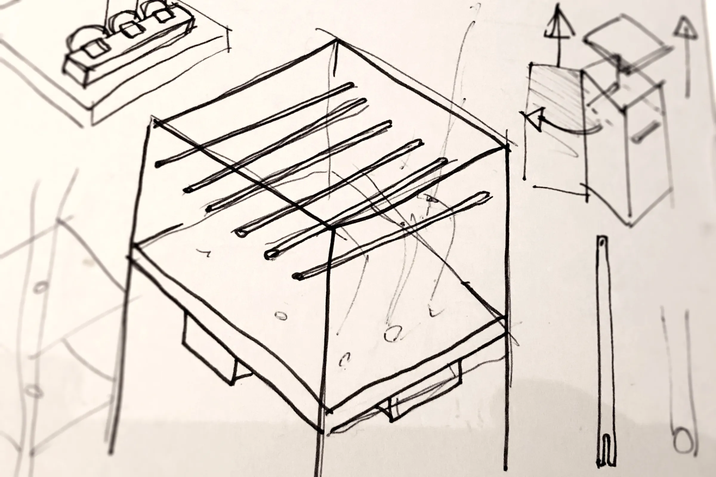 Sketch of the top of the cabinet with parallel guide rails and the pin openings below them
