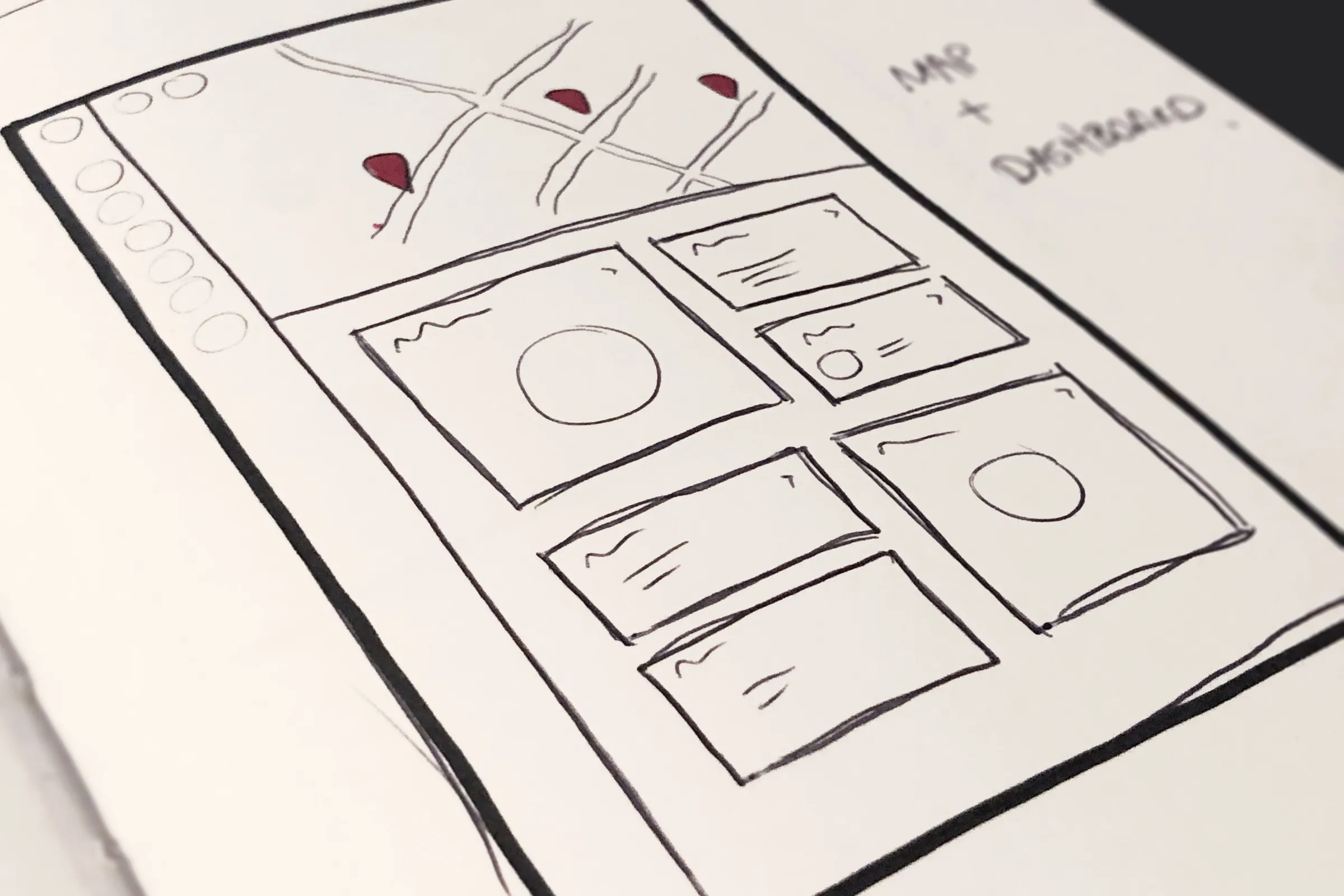 Notebook sketch of a map with red location pins above a grid of dashboard cards